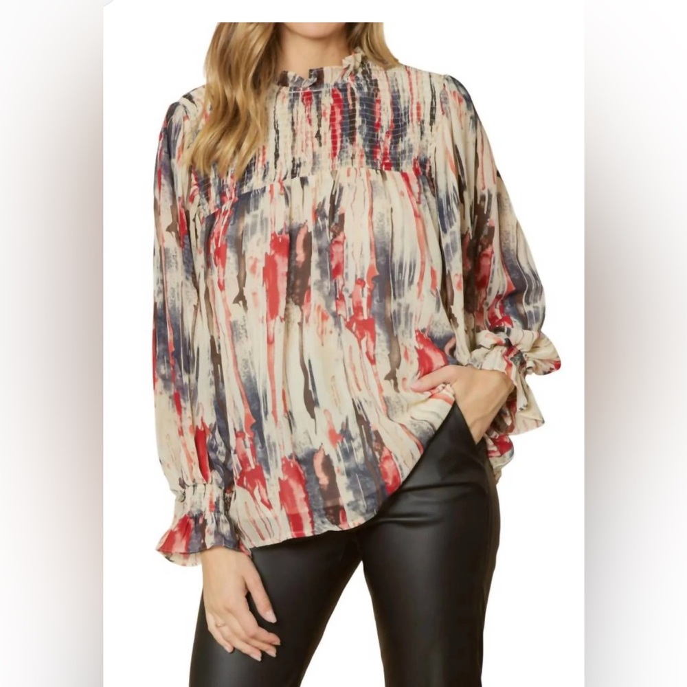 Entro abstract bubble sleeve blouse. Size M. EUC. Cream, red, blue, brown.